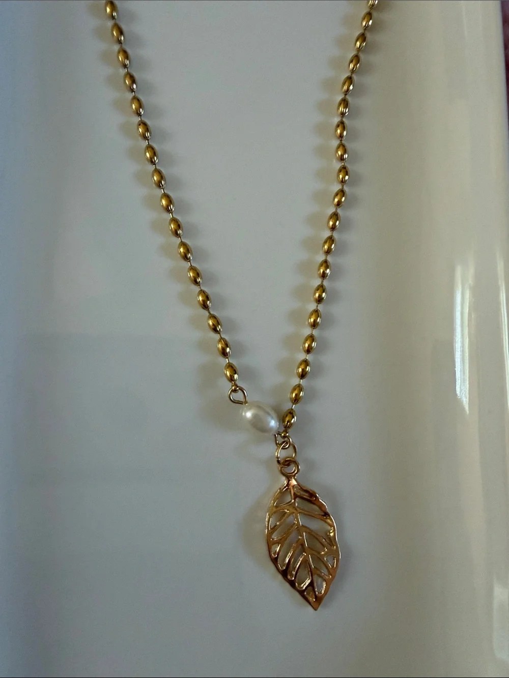 Gold Leaf Pendant Necklace with Pearl Accent